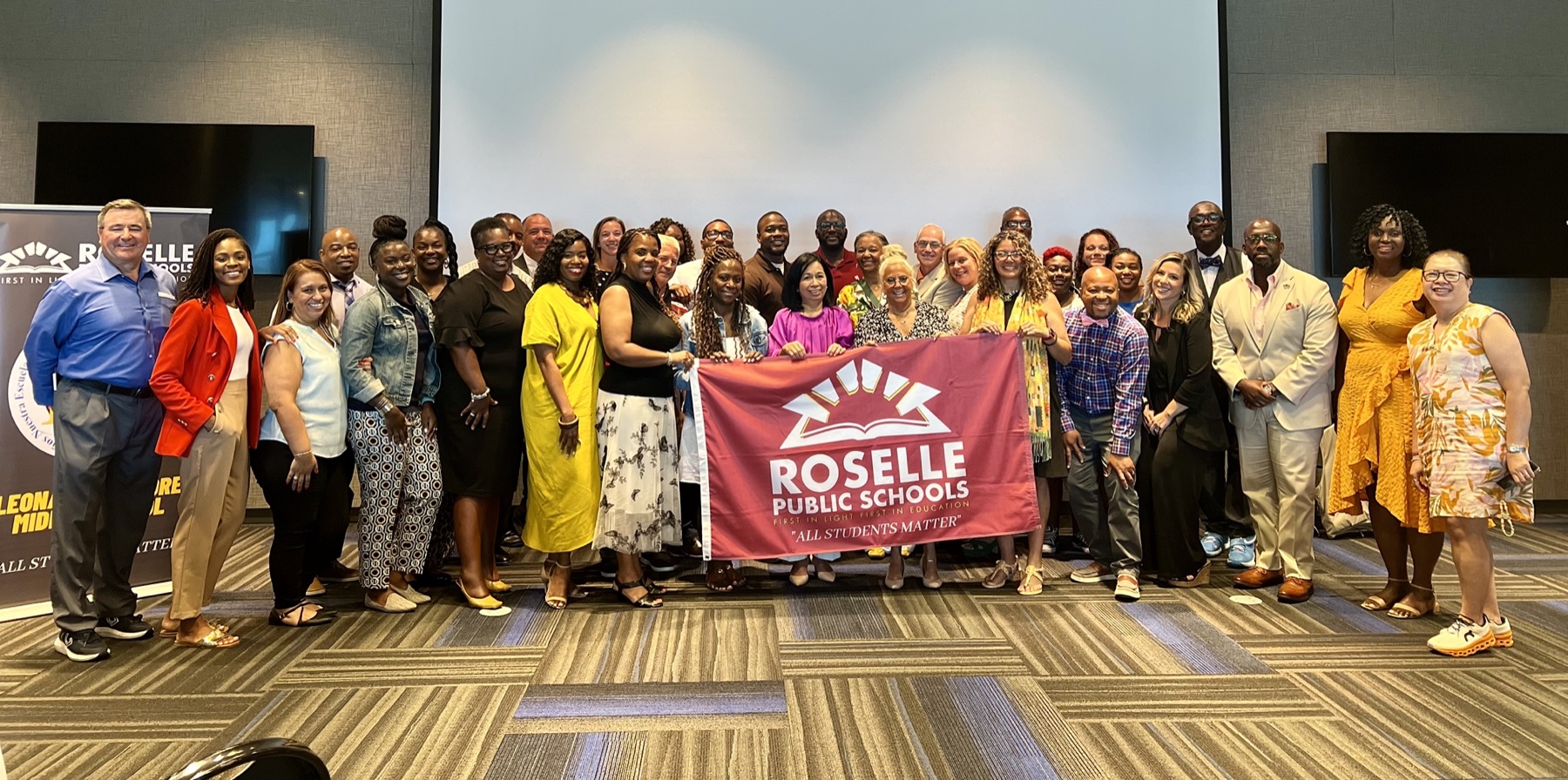 Dr. Joyce with educators and students